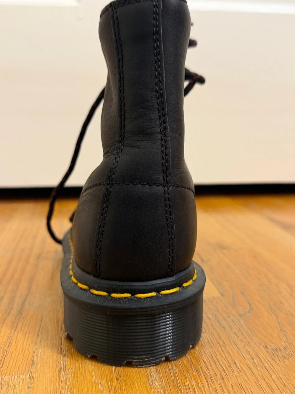 Dr. Martens Black Leather Hiking-Style Boots with Yellow Stitching
